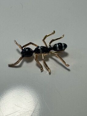 Enamel Brooch Pin in Black and Gold